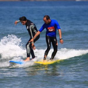 Aprender a hacer surf en Somo